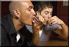 men drinking shots